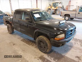 2003 Dodge Dakota Sport with VIN 1D7HG38N03S144856, listed as a IAAI auction lot 41842049 with 162,788 mi miles and . Bid and sale history available at carsss.com. Image 1.