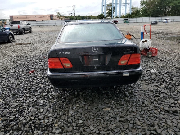 1999 Mercedes-Benz E-Class with VIN WDBJF65H4XA883351, listed as a Copart auction lot 73682964 with 156,446 mi miles and Salvage Title. Bid and sale history available at carsss.com. Image 6.