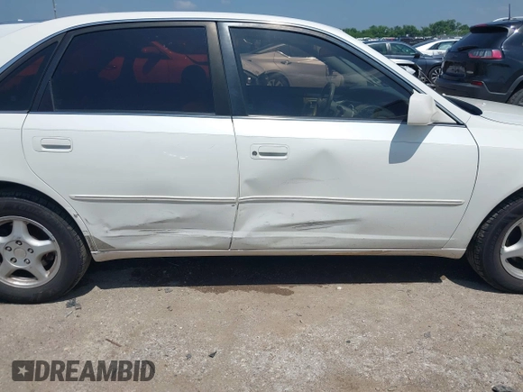 2001 Toyota Avalon XL z VIN 4T1BF28B91U183347, wystawiony jako IAAI lot #42441956 z przebiegiem 310 167 mil mil oraz . Historia ofert i sprzedaży dostępna na DreamBid. Obrazek 6.