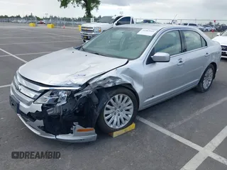 2010 Ford Fusion Hybrid with VIN 3FADP0L37AR261099, listed as a IAAI auction lot 41903543 with 160,070 mi miles. Bid and sale history available at carsss.com. Image 2.