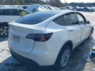 2022 Tesla Model Y Long Range with VIN 7SAYGDEE1NA013066, listed as a IAAI auction lot 41646912 with Not Provided miles and . Bid and sale history available at DreamBid. Image 4.