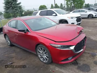 2020 Mazda 3 Premium with VIN JM1BPAEM5L1168219, listed as a IAAI auction lot 42496288 with 84,677 mi miles and . Bid and sale history available at DreamBid. Image 1.