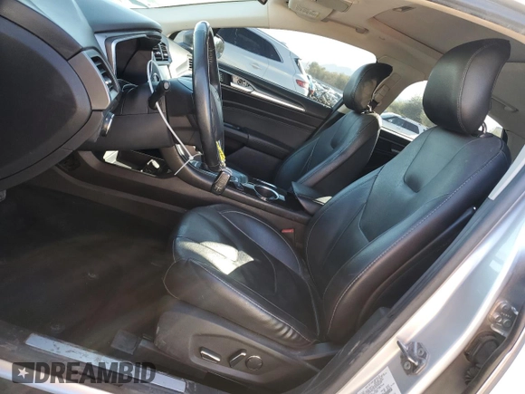 2013 Ford Fusion Titanium Hybrid with VIN 3FA6P0RU5DR321121, listed as a Copart auction lot 77019974 with 160,361 mi miles and Salvage Title. Bid and sale history available at DreamBid. Image 7.