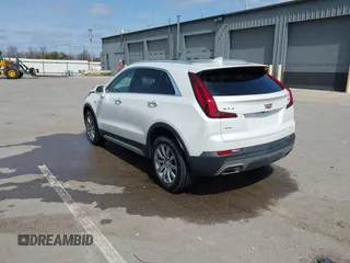 2020 Cadillac XT4 AWD Premium Luxury z VIN 1GYFZDR44LF036461, wystawiony jako IAAI lot #41934371 z przebiegiem 90 545 mil mil oraz . Historia ofert i sprzedaży dostępna na DreamBid. Obrazek 3.