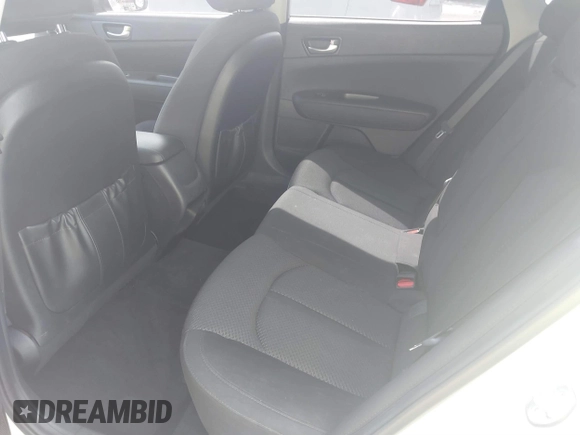 2018 Kia Optima LX with VIN 5XXGT4L31JG267716, listed as a IAAI auction lot 41890611 with 63,491 mi miles and . Bid and sale history available at carsss.com. Image 8.