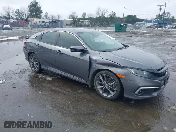 2019 Honda Civic Sedan EX with VIN 19XFC1F31KE002777, listed as a IAAI auction lot 41571361 with 115,277 mi miles. Bid and sale history available at carsss.com. Image 1.