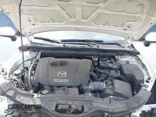 2018 Mazda 3 Sport z VIN 3MZBN1U7XJM197018, wystawiony jako IAAI lot #42229988 z przebiegiem 82 555 mil mil oraz . Historia ofert i sprzedaży dostępna na DreamBid. Obrazek 10.