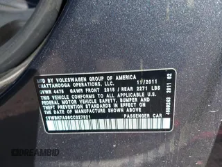 2012 Volkswagen Passat SE with VIN 1VWBH7A36CC027321, listed as a IAAI auction lot 41596709 with 173,357 mi miles and . Bid and sale history available at DreamBid. Image 9.