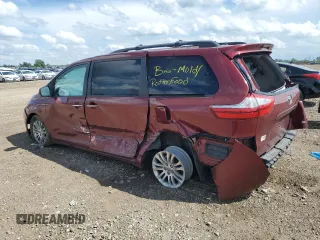 2016 Toyota Sienna XLE with VIN 5TDYK3DC5GS730870, listed as a Copart auction lot 62107505 with 131,619 mi miles and Salvage title. Bid and sale history available at DreamBid. Image 2.
