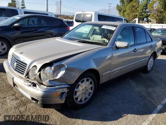 1998 Mercedes-Benz E-Class with VIN WDBJF65FXWA497997, listed as a Copart auction lot 87969125 with 145,322 mi miles and Salvage Title. Bid and sale history available at carsss.com. Image 1.