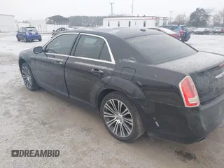 2013 Chrysler 300 with VIN 2C3CCABT7DH652797, listed as a IAAI auction lot 41602405 with 203,920 mi miles. Bid and sale history available at carsss.com. Image 3.