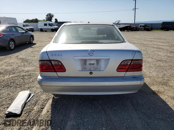 2000 Mercedes-Benz E-Class with VIN WDBJF65J4YB159268, listed as a Copart auction lot 50923115 with 127,650 mi miles and Salvage Title. Bid and sale history available at carsss.com. Image 6.
