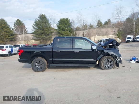 2022 Ford F-150 Lightning Pro z VIN 1FT6W1EV3NWG03970, wystawiony jako IAAI lot #41801986 z przebiegiem 29 815 mil mil oraz . Historia ofert i sprzedaży dostępna na DreamBid. Obrazek 13.