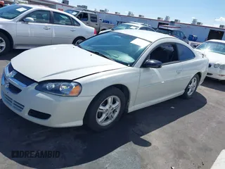 2003 Dodge Stratus SE z VIN 4B3AG42G93E196528, wystawiony jako IAAI lot #41941304 z przebiegiem 191 930 mil mil oraz . Historia ofert i sprzedaży dostępna na DreamBid. Obrazek 13.