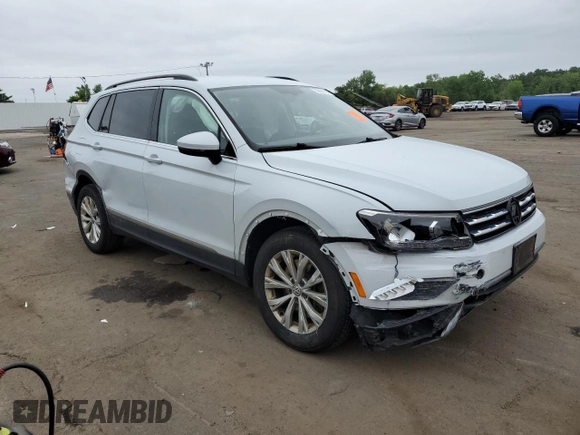2018 Volkswagen Tiguan SEL with VIN 3VV2B7AX3JM185619, listed as a Copart auction lot 59421195 with 164,431 mi miles and Salvage title. Bid and sale history available at DreamBid. Image 4.