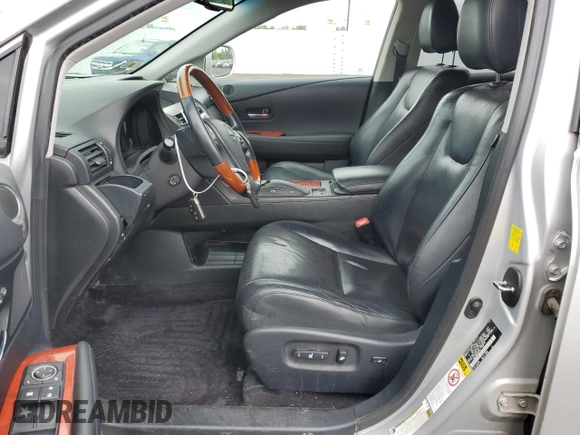2010 Lexus RX 450h with VIN JTJBC1BA2A2022273, listed as a Copart auction lot 57465834 with 105,515 mi miles and Salvage Title. Bid and sale history available at DreamBid. Image 7.