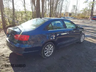 2014 Volkswagen Jetta Sedan SE w/Connectivity with VIN 3VWD07AJ0EM440285, listed as a IAAI auction lot 41259140 with 92,346 mi miles. Bid and sale history available at carsss.com. Image 4.