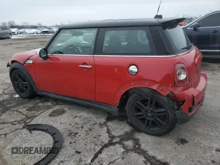 2013 MINI Hardtop S with VIN WMWSV3C56DT389389, listed as a Copart auction lot 89288615 with 85,001 mi miles and Salvage title. Bid and sale history available at DreamBid. Image 2.