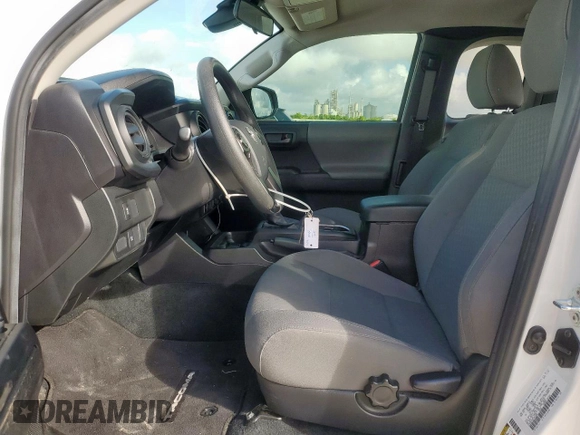 2023 Toyota Tacoma SR with VIN 3TYRX5GN3PT071058, listed as a Copart auction lot 62733165 with 28,441 mi miles and Salvage title. Bid and sale history available at DreamBid. Image 7.
