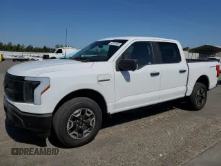 2023 Ford F-150 Lightning Pro with VIN 1FT6W1EVXPWG44972, listed as a Copart auction lot 60303485 with 19,788 mi miles and Salvage title. Bid and sale history available at DreamBid. Image 1.