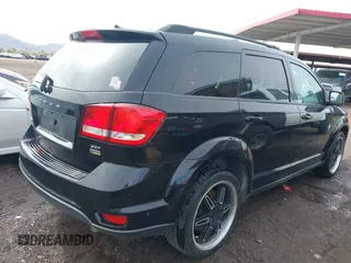 2014 Dodge Journey SXT with VIN 3C4PDCBG1ET127798, listed as a IAAI auction lot 41799898 with 178,873 mi miles and . Bid and sale history available at DreamBid. Image 4.