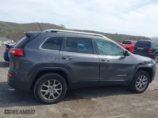 2014 Jeep Cherokee Latitude with VIN 1C4PJMCS8EW138499, listed as a IAAI auction lot 42098609 with 149,782 mi miles. Bid and sale history available at carsss.com. Image 13.