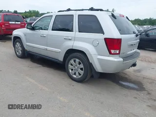 2009 Jeep Grand Cherokee Limited with VIN 1J8HR58T39C529094, listed as a IAAI auction lot 42642778 with 132,103 mi miles and . Bid and sale history available at DreamBid. Image 3.