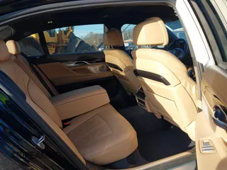 2017 BMW 7 Series 750i with VIN WBA7F0C34HGM21805, listed as a IAAI auction lot 41446797 with 88,753 mi miles and . Bid and sale history available at DreamBid. Image 8.