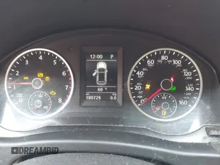 2014 Volkswagen Tiguan SEL with VIN WVGAV3AX7EW022239, listed as a IAAI auction lot 42381670 with 180,729 mi miles and . Bid and sale history available at DreamBid. Image 7.