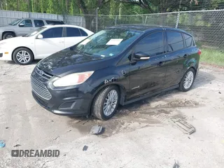 2013 Ford C-Max SE z VIN 1FADP5AU6DL517227, wystawiony jako IAAI lot #42436140 z przebiegiem 156 134 mil mil oraz . Historia ofert i sprzedaży dostępna na DreamBid. Obrazek 2.