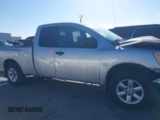 2004 Nissan Titan SE with VIN 1N6AA06A74N553025, listed as a IAAI auction lot 41466773 with 182,110 mi miles. Bid and sale history available at carsss.com. Image 13.