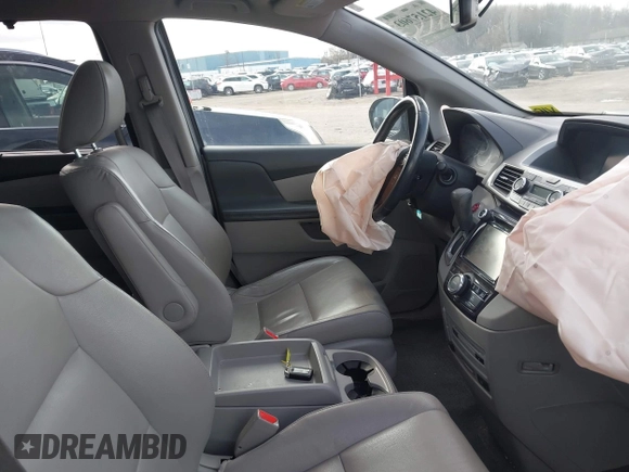 2016 Honda Odyssey Touring Elite z VIN 5FNRL5H99GB072860, wystawiony jako IAAI lot #42157603 z przebiegiem 221 449 mil mil oraz . Historia ofert i sprzedaży dostępna na DreamBid. Obrazek 5.