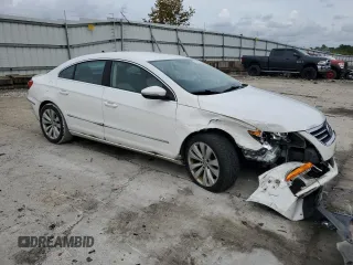 2011 Volkswagen CC Sport with VIN WVWMN7ANXBE731918, listed as a Copart auction lot 73148044 with 160,189 mi miles and Salvage Title. Bid and sale history available at carsss.com. Image 4.