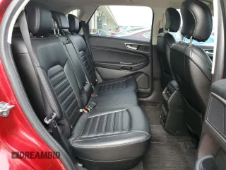 2019 Ford Edge SEL z VIN 2FMPK3J93KBC70523, wystawiony jako Copart lot #53424725 z przebiegiem 71 472 mil mil oraz Szkoda całkowita • Salvage title. Historia ofert i sprzedaży dostępna na DreamBid. Obrazek 11.