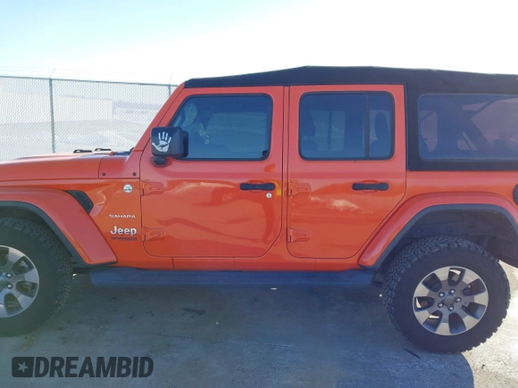 2018 Jeep Wrangler Unlimited Sahara with VIN 1C4HJXEN1JW198258, listed as a IAAI auction lot 41440346 with 44,469 mi miles and . Bid and sale history available at DreamBid. Image 15.