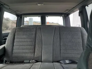 1989 GMC Safari z VIN 1GKDM15Z4KB517560, wystawiony jako Copart lot #51775615 z przebiegiem 152 882 mil mil oraz Szkody całkowita. Historia ofert i sprzedaży dostępna na DreamBid. Obrazek 10.