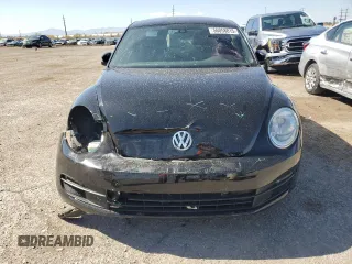 2016 Volkswagen Beetle S с VIN 3VWF07AT3GM606019, выставлен на аукционе Copart как лот 56058815 с пробегом Не указан миль и Списание • Salvage title. История ставок и продаж доступна на DreamBid. Изображение 5.