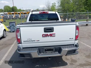 2019 GMC Canyon 4WD SLE z VIN 1GTG6CENXK1319647, wystawiony jako IAAI lot #42039568 z przebiegiem 56 371 mil mil oraz . Historia ofert i sprzedaży dostępna na DreamBid. Obrazek 17.