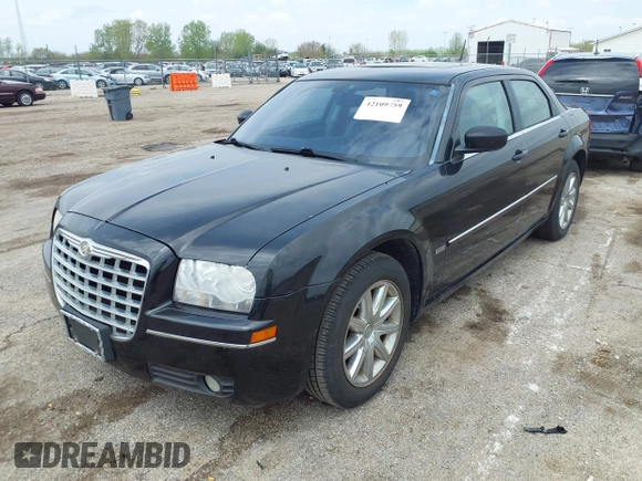2008 Chrysler 300 Touring with VIN 2C3LA53G08H147012, listed as a IAAI auction lot 42109759 with 169,244 mi miles. Bid and sale history available at carsss.com. Image 2.