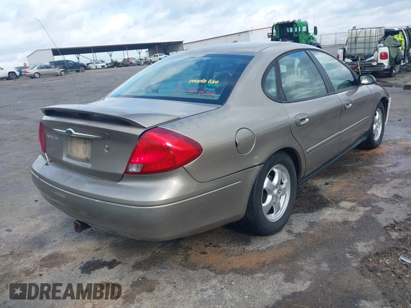 2003 Ford Taurus SE Standard with VIN 1FAFP53U63G125751, listed as a IAAI auction lot 41933803 with 196,710 mi miles. Bid and sale history available at carsss.com. Image 4.
