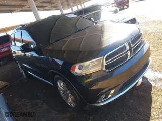 2014 Dodge Durango Limited with VIN 1C4RDHDG9EC306766, listed as a IAAI auction lot 41866574 with 147,746 mi miles. Bid and sale history available at carsss.com. Image 1.