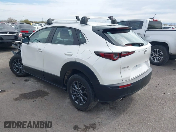 2021 Mazda CX-30 2.5 S with VIN 3MVDMAAL8MM226728, listed as a IAAI auction lot 41492548 with 56,826 mi miles. Bid and sale history available at carsss.com. Image 3.