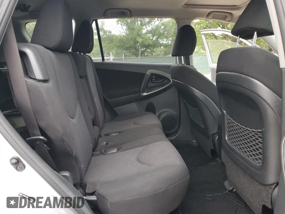 2012 Toyota RAV4 Sport with VIN JTMRF4DV5CD044821, listed as a Copart auction lot 61555935 with 94,301 mi miles and Salvage title. Bid and sale history available at DreamBid. Image 11.