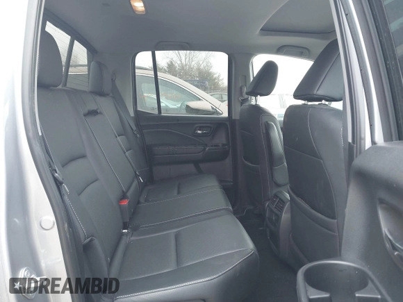2021 Honda Ridgeline RTL-E with VIN 5FPYK3F79MB010091, listed as a IAAI auction lot 41386318 with 37,996 mi miles and . Bid and sale history available at DreamBid. Image 8.