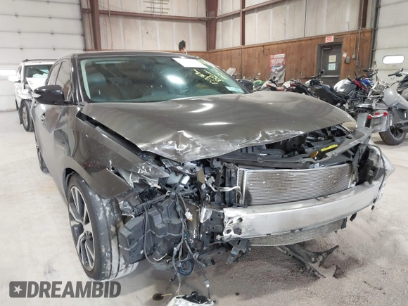 2016 Nissan Maxima Platinum with VIN 1N4AA6AP3GC404618, listed as a IAAI auction lot 42372458 with 133,968 mi miles and . Bid and sale history available at DreamBid. Image 6.