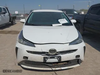 2021 Toyota Prius L Eco with VIN JTDKAMFU6M3141263, listed as a IAAI auction lot 40593951 with 95,921 mi miles. Bid and sale history available at carsss.com. Image 12.