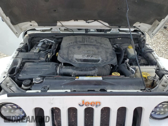 2012 Jeep Wrangler Arctic with VIN 1C4AJWBG1CL154184, listed as a Copart auction lot 50865135 with 152,767 mi miles and Clean title. Bid and sale history available at DreamBid. Image 11.