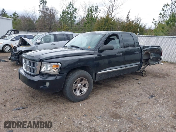 2008 Dodge Dakota Laramie with VIN 1D7HW58NX8S602604, listed as a IAAI auction lot 41717006 with 167,023 mi miles. Bid and sale history available at carsss.com. Image 2.