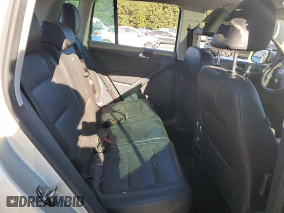 2014 Volkswagen Tiguan SE with VIN WVGAV3AX9EW611860, listed as a Copart auction lot 74431754 with 116,022 mi miles and Salvage title. Bid and sale history available at DreamBid. Image 11.