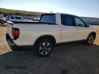 2019 Honda Ridgeline Sport with VIN 5FPYK2F14KB004329, listed as a Copart auction lot 76247454 with 132,291 mi miles and Salvage title. Bid and sale history available at DreamBid. Image 3.